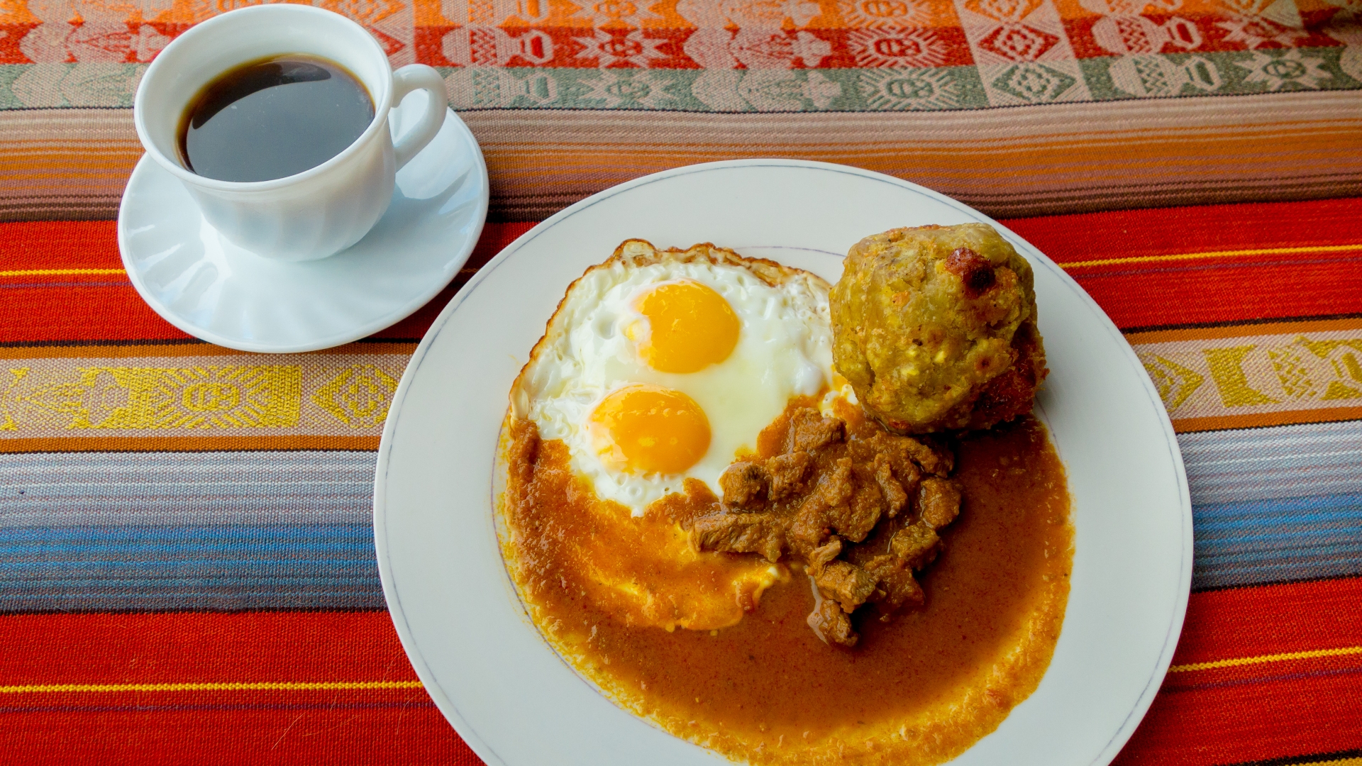 Bolón de verde it’s a classic breakfast dish that’s served with coffee Bolón de verde it’s a classic breakfast dish that’s served with coffee